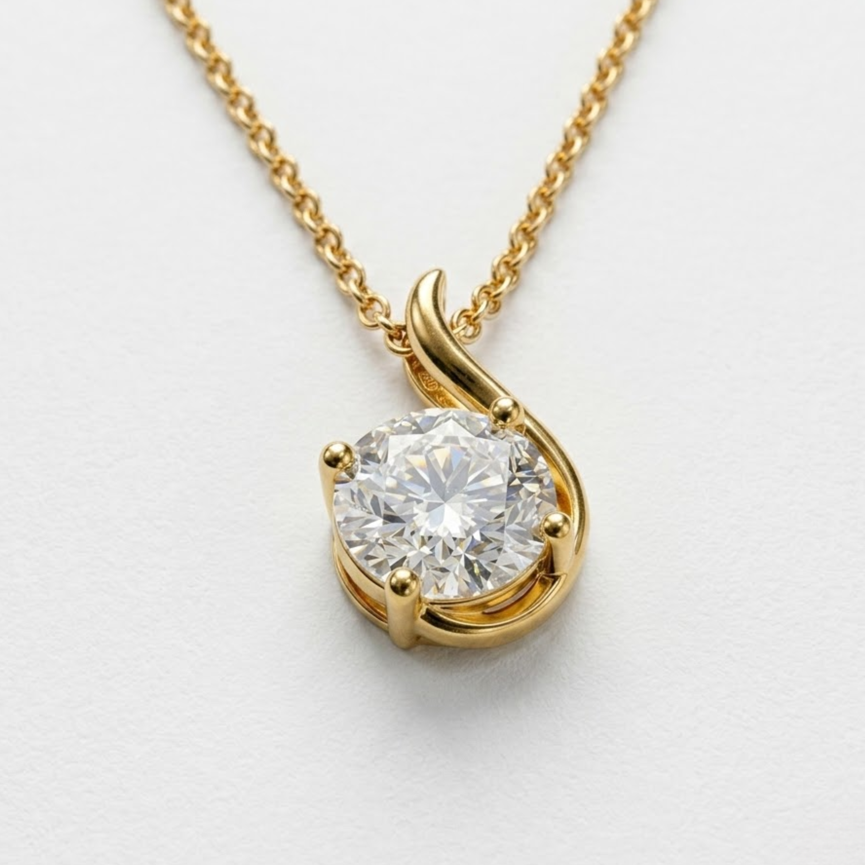 14k yellow gold necklace with natural white diamond prong-set pendant, April birthstone, symbolic gift.