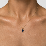 18k gold vermeil pendant with oval created blue sapphire in prong setting — September birthstone gift