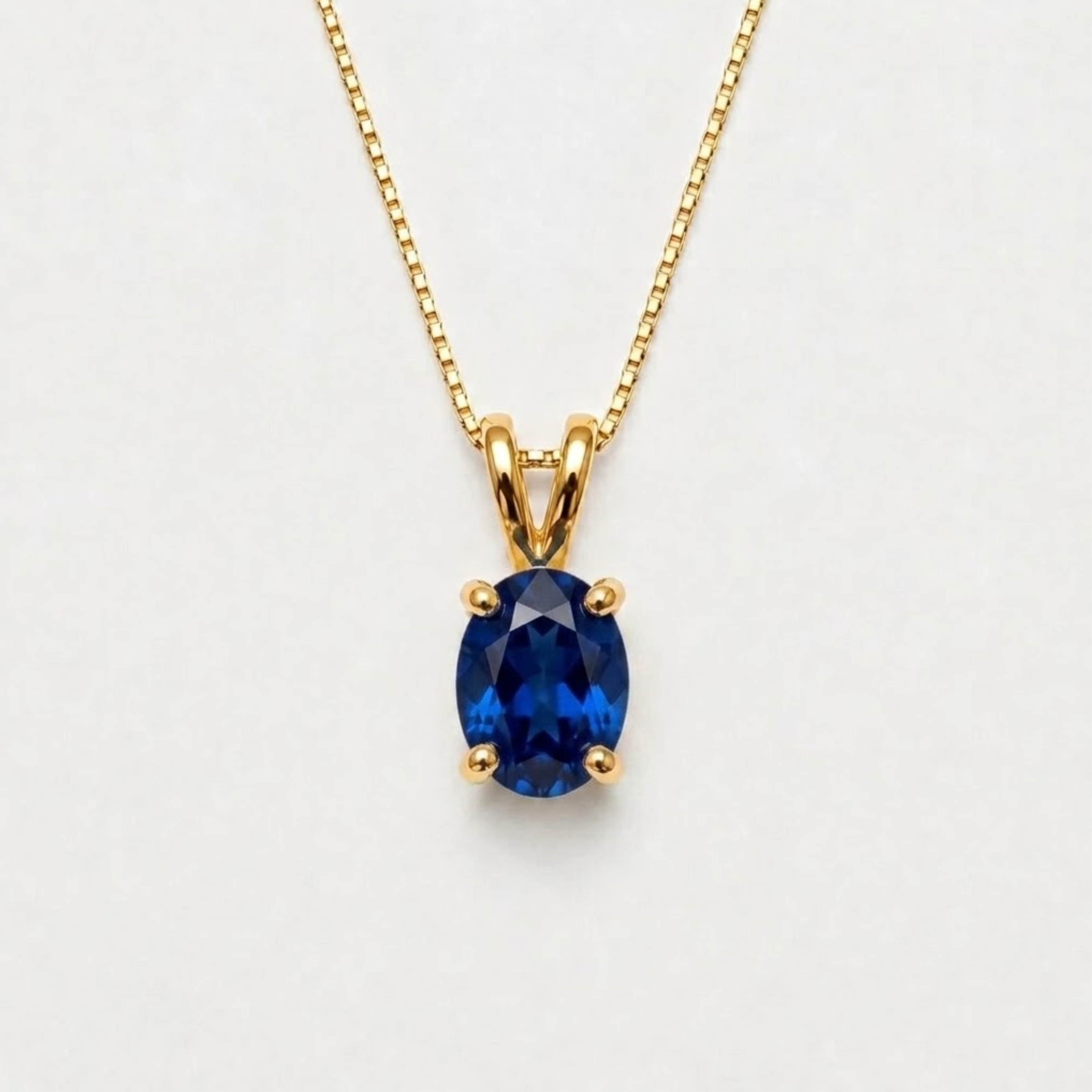 Created Sapphire Pendant made in 18k Gold Vermeil with Oval Created blue Sapphire in Prong setting, September Birthstone gift idea, symbolizes sincerity, truth, and faithfulness, ideal for everyday wear and perfect for birthday gifting and special occasions.