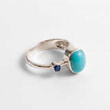 Sterling 925 turquoise bezel ring with oval blue stone, December birthstone symbolizing protection, healing & communication