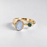 Oval rainbow moonstone set in 18k gold vermeil bezel, symbolizing hope and protection, ideal for birthday or everyday wear.