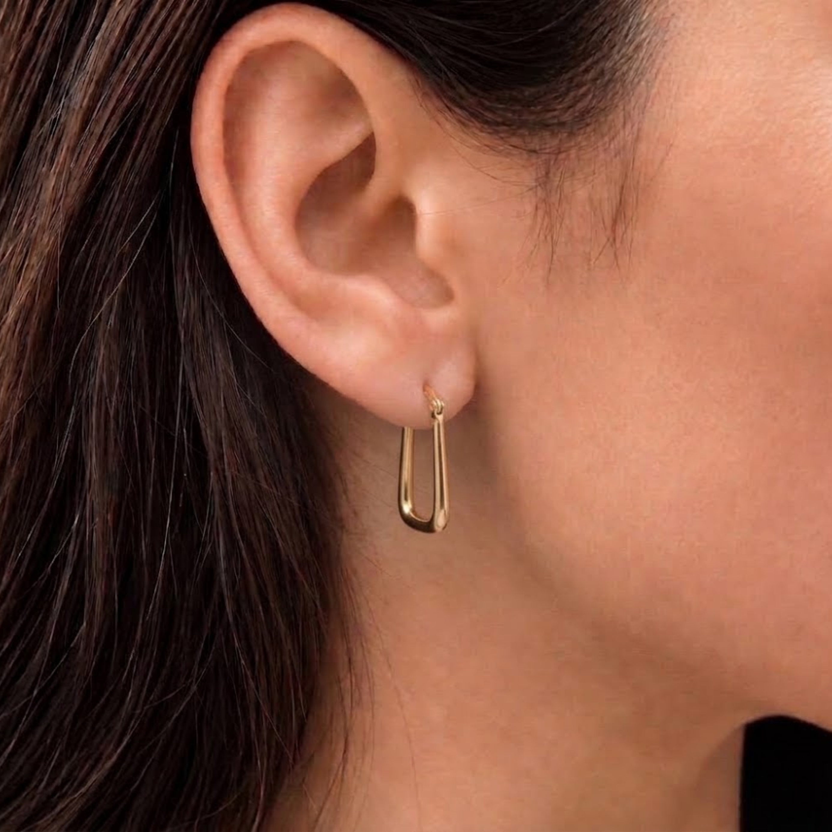 Close-up of 18k gold vermeil rectangular hinged hoops, geometric everyday earrings ideal for gifting