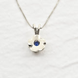 925 Sterling Silver necklace set with blue tanzanite december birthstone, in a round cut and prong setting. Ideal gift for her, perfect for everyday wear.