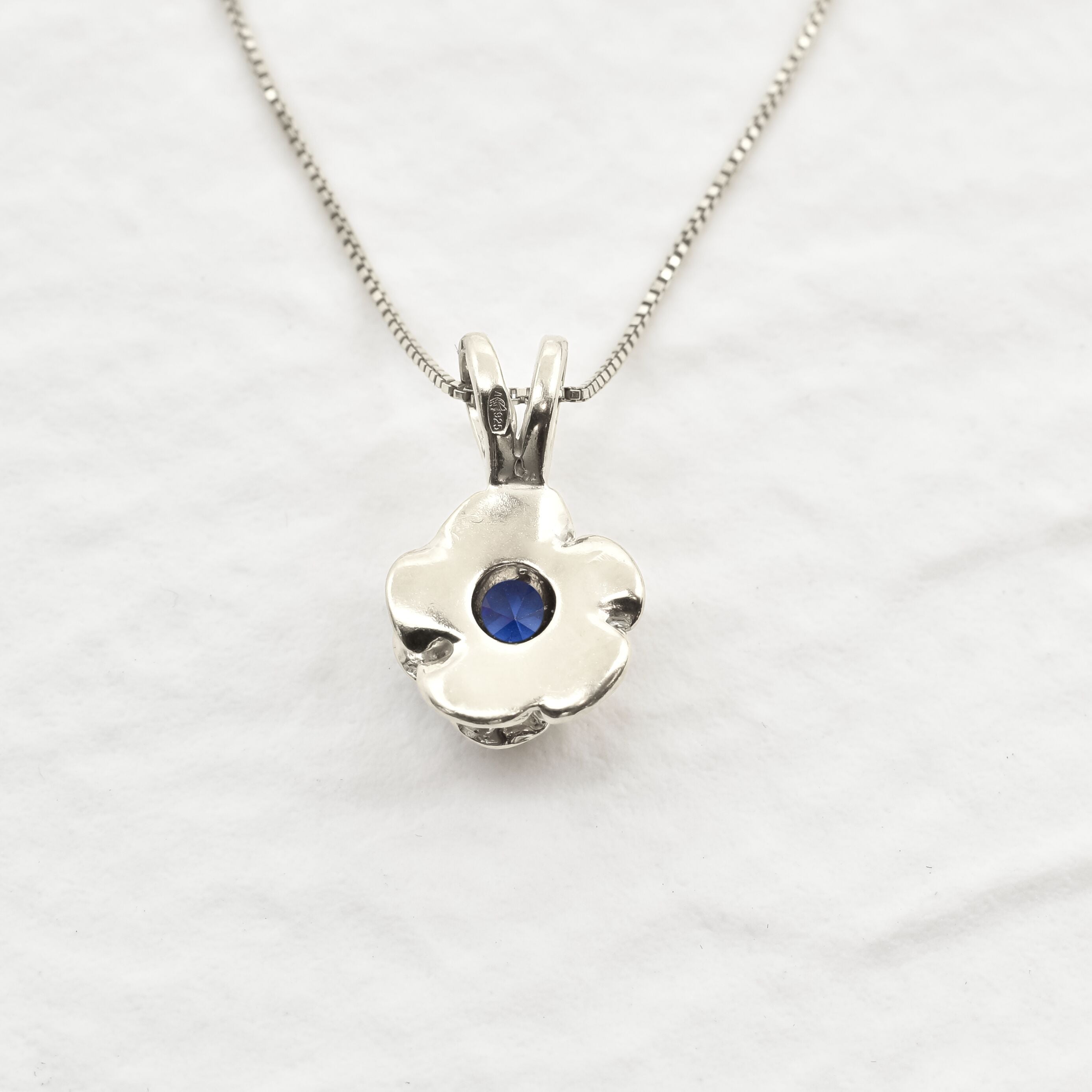 925 Sterling Silver necklace set with blue tanzanite december birthstone, in a round cut and prong setting. Ideal gift for her, perfect for everyday wear.