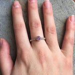 Amethyst Ring worn on ring finger with natural nails, crafted in a sterling silver bubble band style for a modern yet classic look. Known as a stone of peace and focus, this ring pairs effortlessly with minimalist outfits and is perfect for birthdays, date nights, and holiday parties.