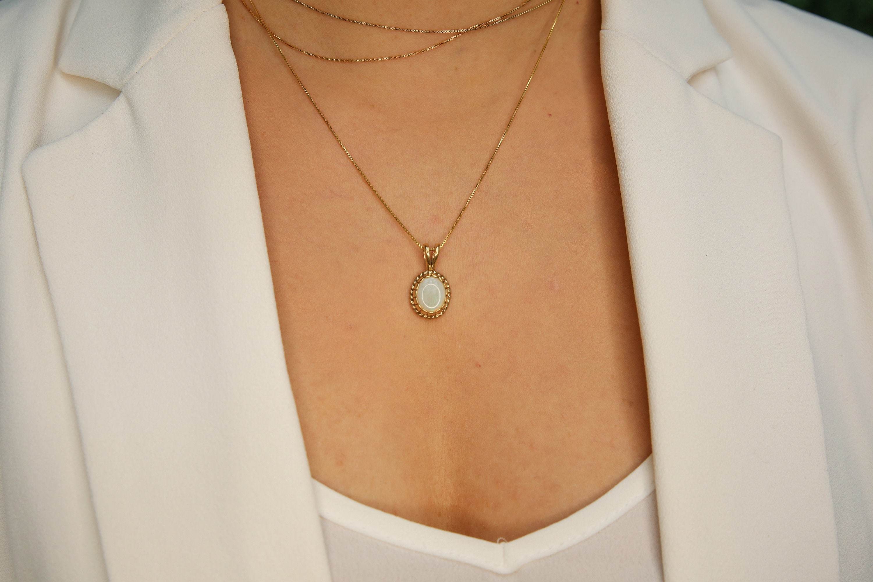 Calming opal necklace believed to inspire hope and emotional healing benefits.