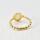 Natural Opal beaded gold ring with a smooth cabochon cut gemstone, offering a minimalist yet elegant style perfect for everyday wear. Opal, the October birthstone, is believed to inspire creativity and emotional balance, making it a meaningful gift for birthdays, anniversaries, weddings, and milestone celebrations.