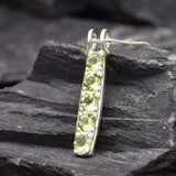 Peridot birthstone pendant necklace, perfect for personalized gift ideas during special celebrations.