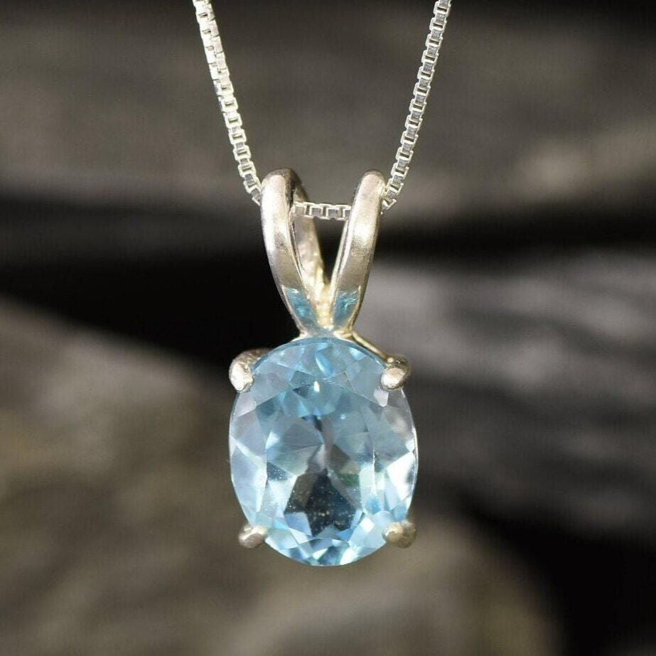 Blue Topaz pendant perfect for celebrating milestones or gifting loved ones