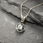 Blue Topaz pendant that reflects tranquility and peaceful expression