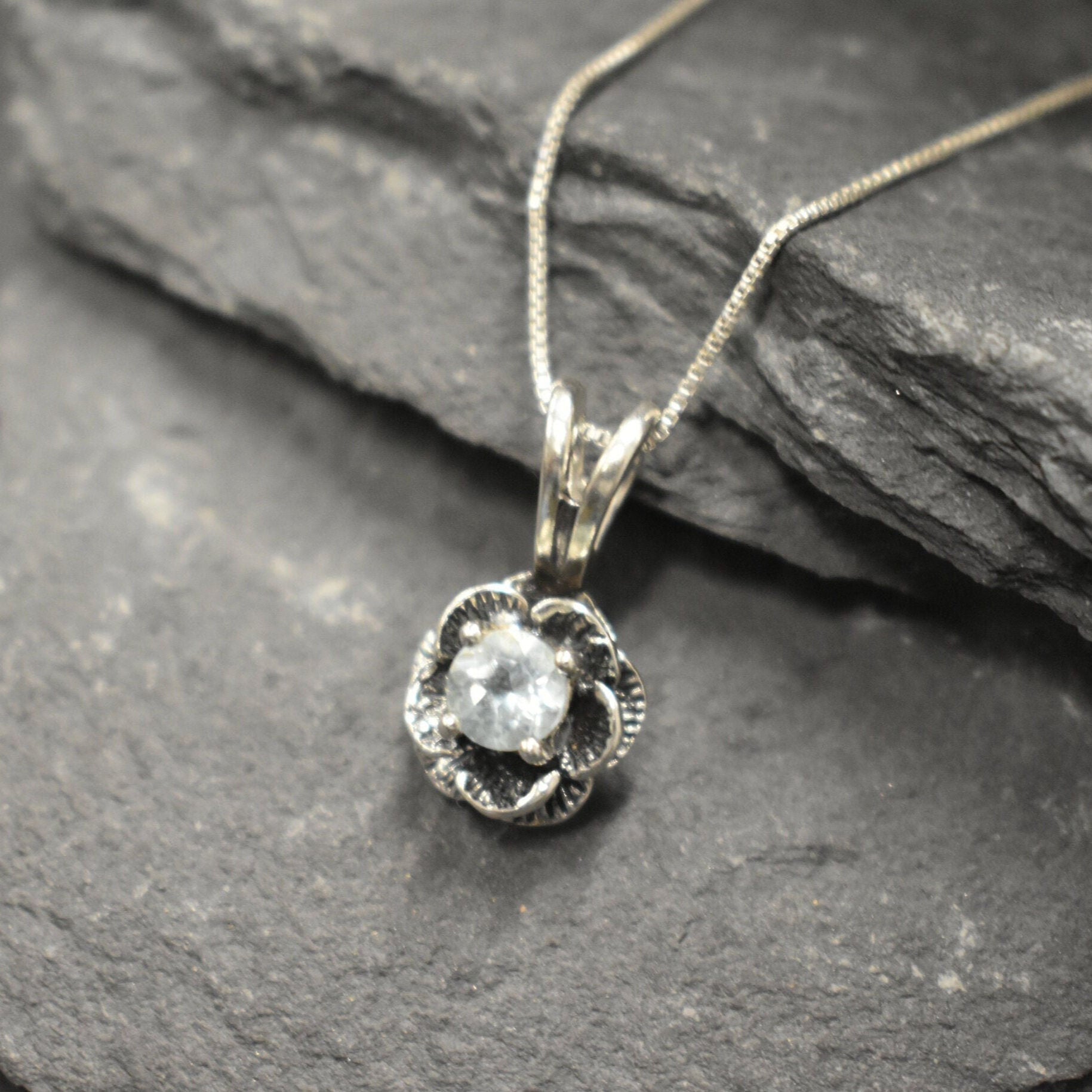 Blue Topaz pendant that reflects tranquility and peaceful expression
