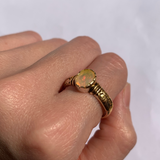 Ethiopian Opal October Birthstone Ring with tribal boho engraved gold band featuring flashes of fire colors, designed for artistic style and uplifting positive energy. A meaningful October Birthstone gift symbolizing hope, balance, and creativity. Perfect for birthdays, anniversaries, weddings, festivals, and evening celebrations.