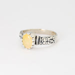 Natural Fire Opal diamond cut tribal engraved ring in solid 925 sterling silver, showcasing flashes of fire colors in a bold boho style. The embossed ornament band ensures durability while offering a unique artistic look. As the October Birthstone, Fire Opal makes a meaningful gift for birthdays, anniversaries, or personal milestones. Perfect to wear at festivals, cultural gatherings, weddings, and evening celebrations.