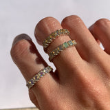 Natural Fire Opal half eternity ring in solid sterling silver, featuring a row of cabochon cut opals, a dainty jewelry piece symbolizing balance and creativity, an ideal October birthstone gift for anniversaries, weddings, or milestone celebrations.