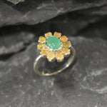 Chrysoprase and Opal Flower Ring in sterling silver featuring a green cabochon chrysoprase center framed with diamond cut opal petals, a statement jewelry style that enhances confidence and creativity while offering flashes of fire colors, making it a meaningful October birthstone gift idea. Perfect for weddings, formal dinners, and festive occasions to showcase elegance and charm.