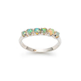 Natural Fire Opal cabochon half eternity ring in solid 925 sterling silver, designed with dainty cabochon stones for timeless elegance and flashes of fire colors. This ring highlights durability and everyday wear while being lightweight and comfortable. As the October Birthstone, Fire Opal makes a meaningful gift for birthdays, anniversaries, or special occasions. Perfect to wear at weddings, cocktail parties, and festive celebrations.