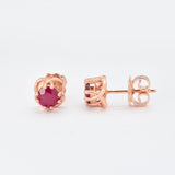 Natural Ruby Earrings in Solid Gold Flower Studs. Dainty red ruby earrings ideal for everyday wear, and a perfect July birthday gift idea