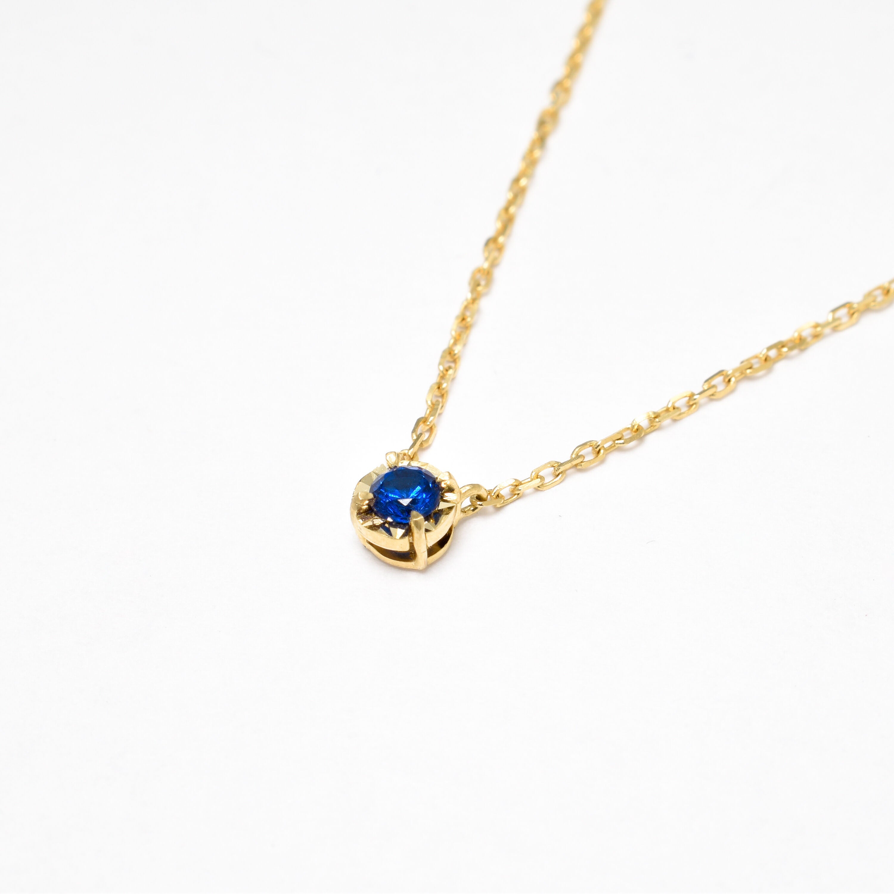Dainty Round Sapphire Pendant set in Solid 14k Yellow Gold Necklace. September birthstone pendant encouraging truth, mental clarity, and spiritual insight. Luxurious and elegant blue sapphire necklace for wisdom, loyalty, focus. Perfect as a September birthday gift, and a beautiful necklace gift idea for her, as everyday necklace.