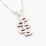 Garnet pendant in sterling silver with geometric arrangement for flair
