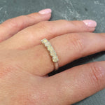 Natural Fire Opal half eternity ring in solid sterling silver, featuring a row of cabochon cut opals, a dainty jewelry piece symbolizing balance and creativity, an ideal October birthstone gift for anniversaries, weddings, or milestone celebrations.