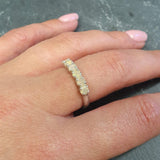 Natural Fire Opal half eternity ring in solid sterling silver, featuring a row of cabochon cut opals, a dainty jewelry piece symbolizing balance and creativity, an ideal October birthstone gift for anniversaries, weddings, or milestone celebrations.