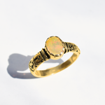 Ethiopian Opal October Birthstone Ring with tribal boho engraved gold band featuring flashes of fire colors, designed for artistic style and uplifting positive energy. A meaningful October Birthstone gift symbolizing hope, balance, and creativity. Perfect for birthdays, anniversaries, weddings, festivals, and evening celebrations.