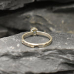 Ethiopian Opal ring in a dainty boho solitaire with a hammered band and oxidized silver bezel showing flashes of fire colors; the protective bezel and textured finish are comfortable for daily wear and help hide small scratches. Thoughtful October Birthstone gift for meaningful minimalist jewelry lovers.
Worn for office days, brunch dates, music festivals, casual weekends, and small weddings.