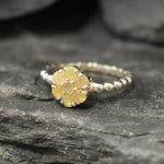 Flower Fire Opal Ring in solid 925 Sterling Silver with dainty bubble band style, designed with flashes of fire colors. Known for its energy of inspiration and positivity, this October birthstone makes a meaningful gift idea for nature lovers and those who adore dainty jewelry styles.
Perfect for anniversaries, birthdays, weddings, and romantic evening events.