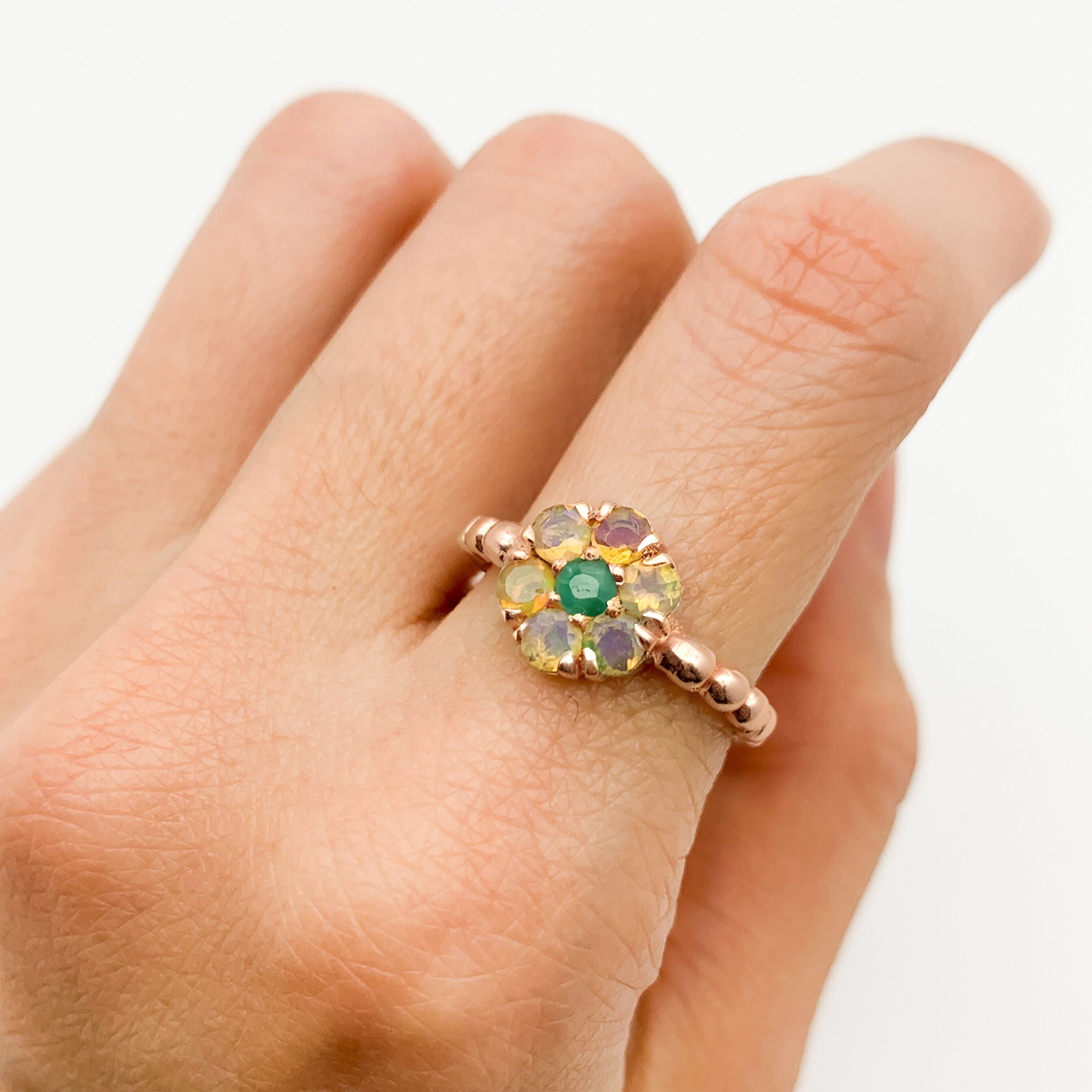 Flower Opal Ring worn on index finger with bare nails, perfect for adding elegance and emotional balance, a versatile jewelry piece for romantic dinners, weddings, or spring outings.