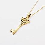 Gold Key Necklace set in 18k Yellow Gold Vermeil over Solid 925 Sterling Silver. Long Key Pendant with Trinity Know, perfect as a statement necklace, can be styled with maximalist outfit.  Trinity knot represents unity, eternal love, and the cycle of existence.