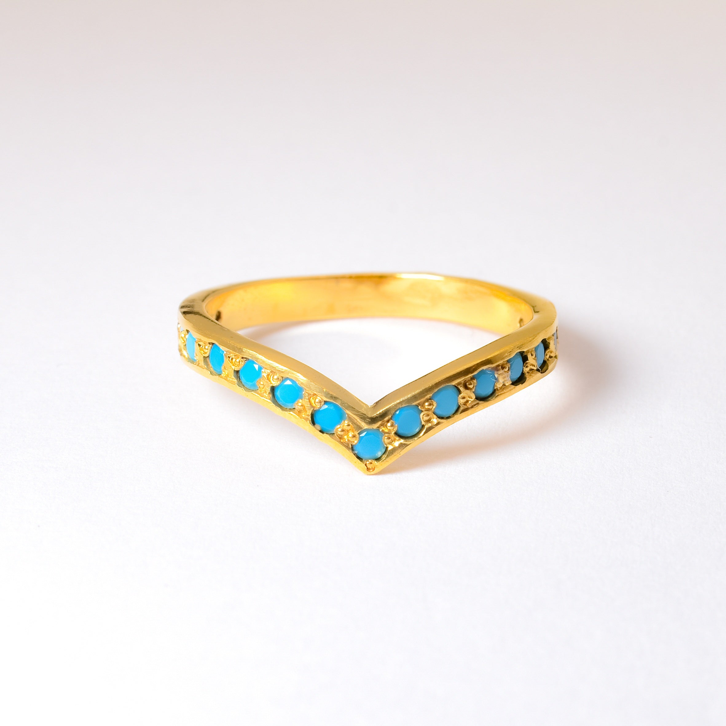 Natural Turquoise Chevron Ring set in 18k Gold Vermeil over Solid 925 Sterling Silver. December birthstone in natural blue color, and round cut, in a V-shaped band for an edgy everyday look. A perfect birthday gift idea for december birthdays