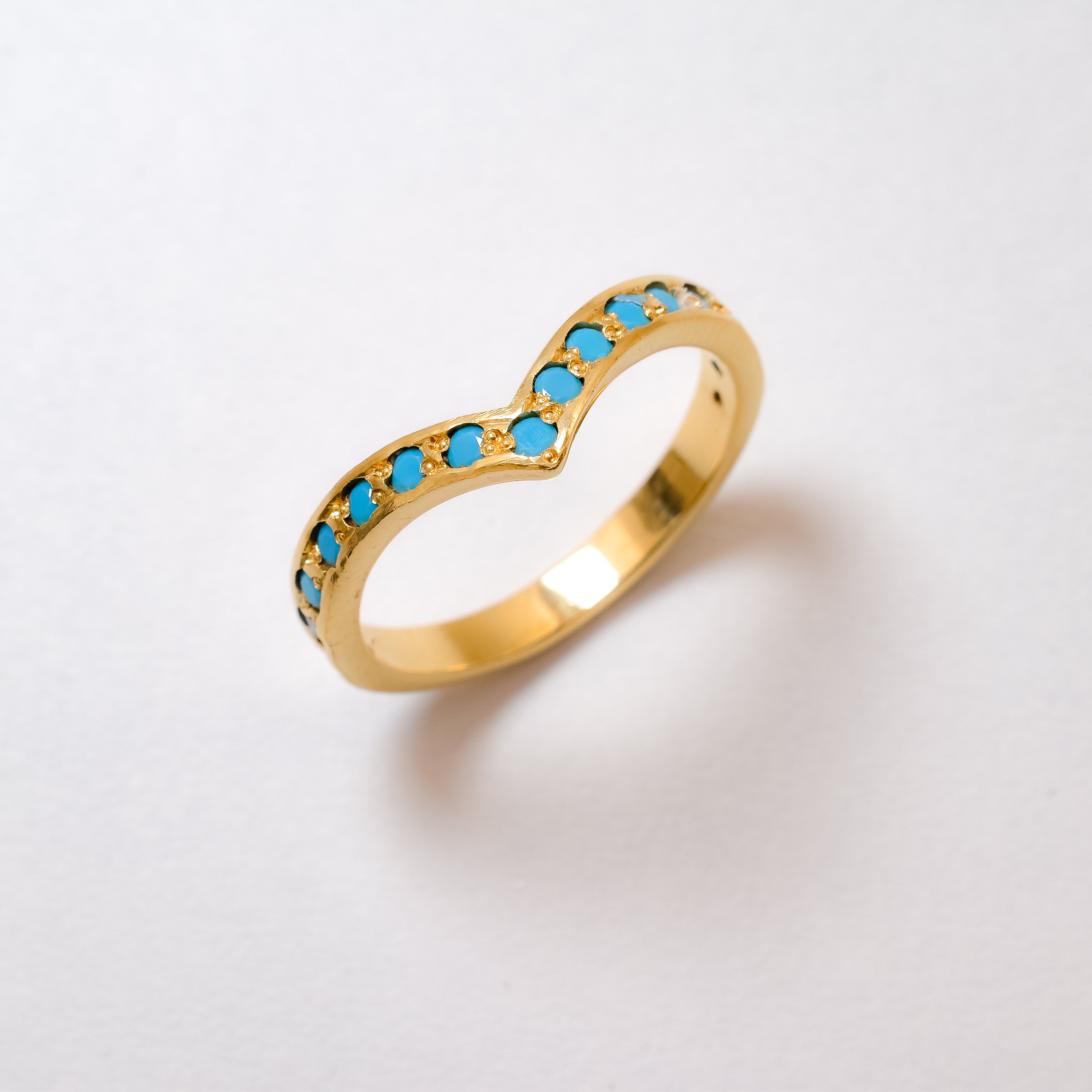Natural Blue Turquoise Ring set in 18k Gold Vermeil over Solid 925 Sterling Silver. December birthstone in natural blue color, and round cut, in a Chevron band and eternity style. Ideal ring gift idea for her, can be worn daily, solo or as a stack ring