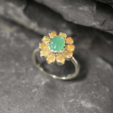 Chrysoprase and Opal Flower Ring in sterling silver featuring a green cabochon chrysoprase center framed with diamond cut opal petals, a statement jewelry style that enhances confidence and creativity while offering flashes of fire colors, making it a meaningful October birthstone gift idea. Perfect for weddings, formal dinners, and festive occasions to showcase elegance and charm.