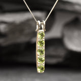 Green peridot pendant in sterling silver, a timeless piece suitable for semi-formal and formal events.