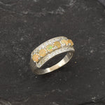 Opal Row Half Eternity Wide Ring in sterling silver featuring natural fire opals with flashes of fire colors, accented by CZ pave for a bold jewelry style. A meaningful October birthstone piece symbolizing balance and inspiration, making it a treasured gift idea. Perfect for weddings, anniversaries, cocktail events, and elegant evening occasions.