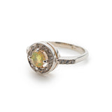 Ethiopian Opal diamond cut halo ring in solid 925 sterling silver, surrounded by sparkling CZ accents for brilliance and elegance. The halo design highlights flashes of fire colors while offering timeless durability. As the October Birthstone, Opal makes a meaningful gift for birthdays, engagements, anniversaries, or personal milestones. Perfect to wear at weddings, cocktail parties, and festive gatherings.