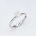Natural Fire Opal solitaire ring set in 18k solid white gold, a timeless jewelry piece symbolizing creativity and passion, the perfect October birthstone gift for anniversaries, engagements, or milestone celebrations.