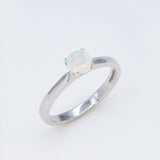 Natural Fire Opal solitaire ring set in 18k solid white gold, a timeless jewelry piece symbolizing creativity and passion, the perfect October birthstone gift for anniversaries, engagements, or milestone celebrations.