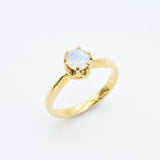 Moonstone ring with a delicate round cut offering a dreamy, ethereal style.