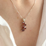 Garnet necklace offering grounding energy and vitality