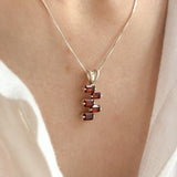 Garnet necklace offering grounding energy and vitality