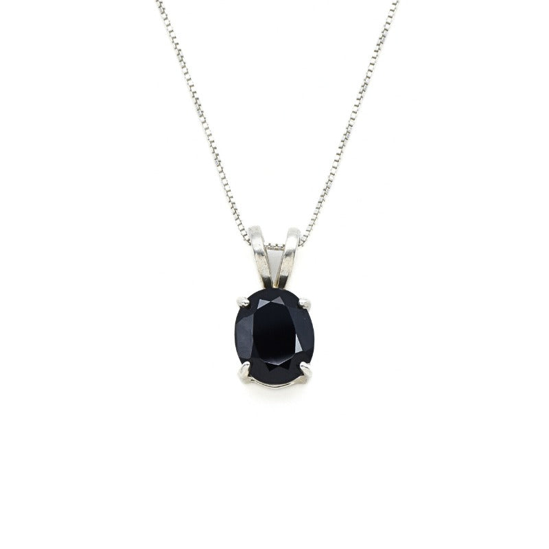 Elegant oval diamond cut black onyx pendant in sterling silver for a refined modern style.