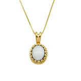 Elegant cabochon cut pendant highlighting a timeless and refined jewelry style.