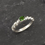 A meaningful birthstone gift featuring a rare and radiant gem.