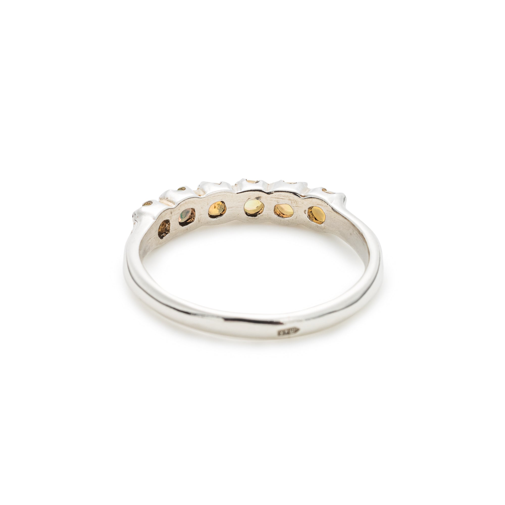 Natural Fire Opal cabochon half eternity ring in solid 925 sterling silver, designed with dainty cabochon stones for timeless elegance and flashes of fire colors. This ring highlights durability and everyday wear while being lightweight and comfortable. As the October Birthstone, Fire Opal makes a meaningful gift for birthdays, anniversaries, or special occasions. Perfect to wear at weddings, cocktail parties, and festive celebrations.