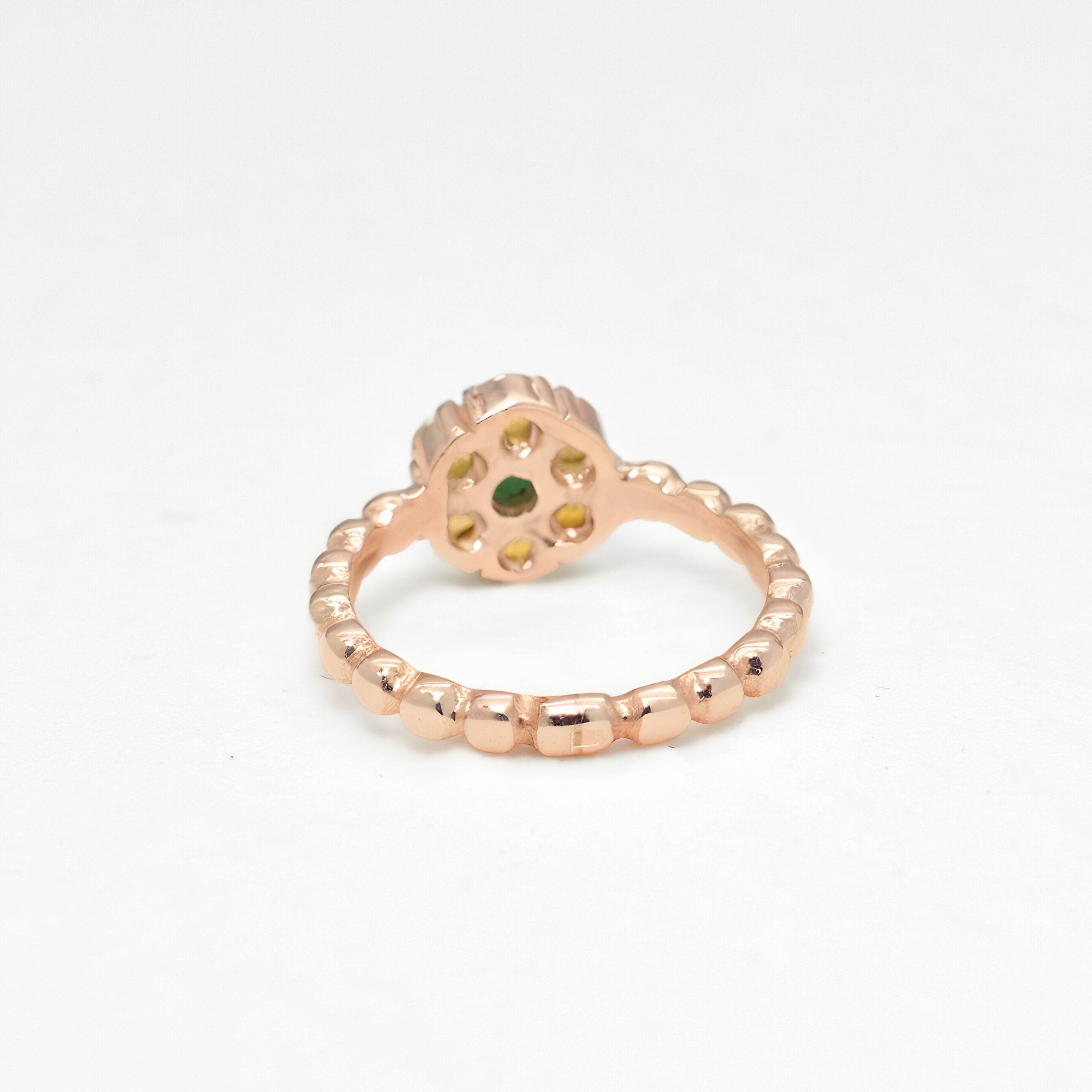 Natural Opal and Emerald Rose Gold Ring ring in a floral cluster design, symbolizing love and harmony, a meaningful jewelry gift for October and May birthstones, ideal for anniversaries, engagements, or milestone celebrations.