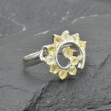 Opal Spiral Ring in sterling silver designed as a sunburst swirl statement jewelry piece offering radiant flashes of fire colors and boho charm, believed to inspire creativity and positivity, making it a thoughtful October birthstone gift idea. Perfect to wear at weddings, parties, and special occasions for a vibrant standout look.