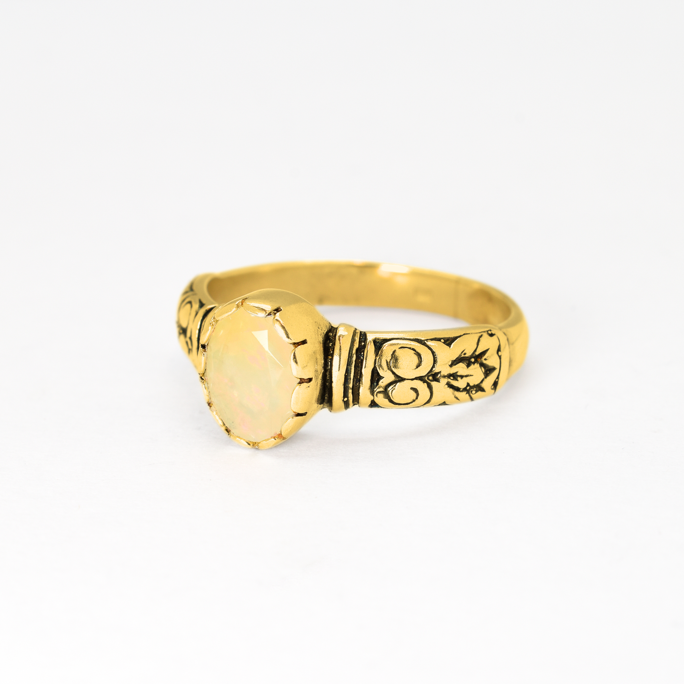 Ethiopian Opal October Birthstone Ring with tribal boho engraved gold band featuring flashes of fire colors, designed for artistic style and uplifting positive energy. A meaningful October Birthstone gift symbolizing hope, balance, and creativity. Perfect for birthdays, anniversaries, weddings, festivals, and evening celebrations.