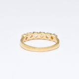 Ethiopian Opal eternity ring in gold with round cabochon gemstones, ideal for stacking or wearing solo, symbolizing everlasting love and inspiration, a meaningful October birthstone gift for weddings, anniversaries, and romantic milestones.