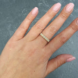 Natural Fire Opal half eternity ring in solid sterling silver, featuring a row of cabochon cut opals, a dainty jewelry piece symbolizing balance and creativity, an ideal October birthstone gift for anniversaries, weddings, or milestone celebrations.